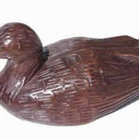 Duck carved of wood