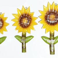 Three wooden sunflowers