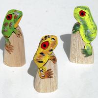 Small wooden frogs
